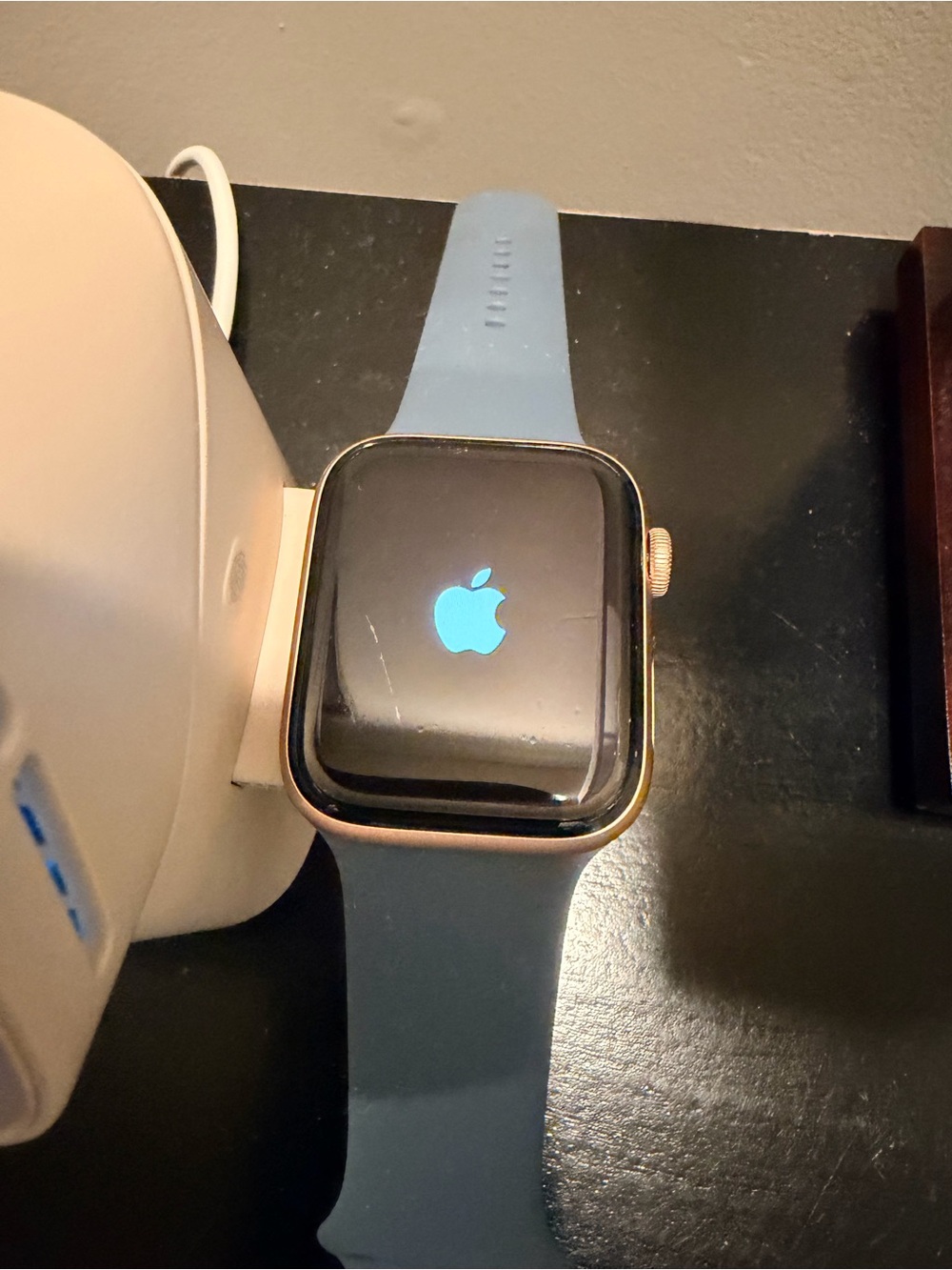 Apple Watch Gold Case with Light Blue Sport Band